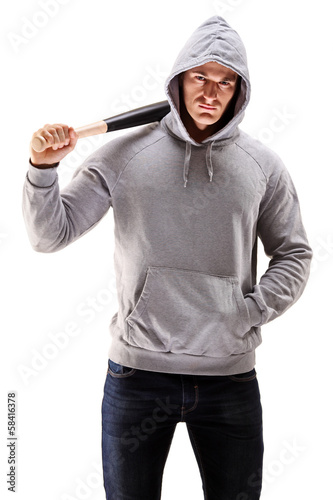 Photo: Male with hood over his head holding a baseball bat Male with hood over his head holding a baseball bat