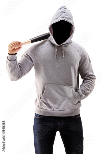 Photo: Man in a hoodie holding a baseball bat Man in a hoodie holding a baseball bat