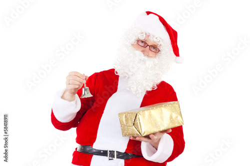 Photo: Santa Claus chimes the bell due to Christmas Eve Santa Claus chimes the bell due to Christmas Eve