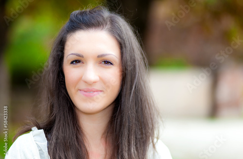 Photo: Smiling woman at the park Smiling woman at the park