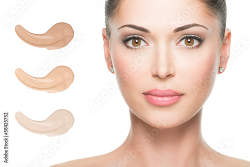Photo: Model face of beautiful woman with foundation on skin Model face of beautiful woman with foundation on skin