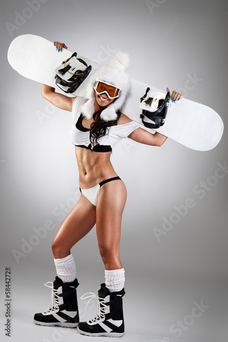 Photo: Sexy dressed snowboarder Sexy dressed snowboarder
