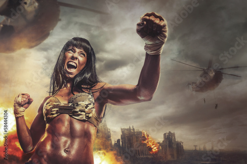 Photo: Female warrior attacking a hand in battle Female warrior attacking a hand in battle