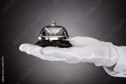 Photo: Hand Holding Service Bell Hand Holding Service Bell