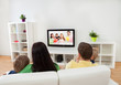 Young family watching TV Young family watching TV