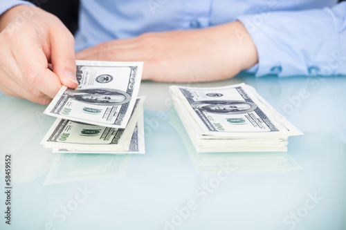 Photo: Businesswoman Counting Bank Note Businesswoman Counting Bank Note