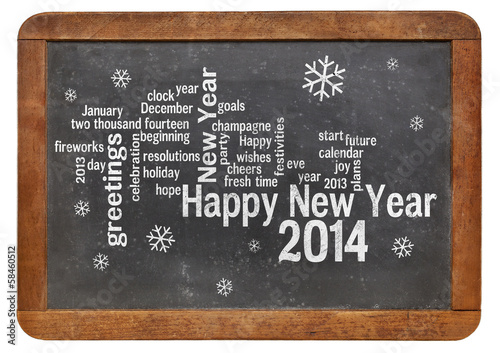 Photo: Happy New Year 2014 on blackboard Happy New Year 2014 on blackboard