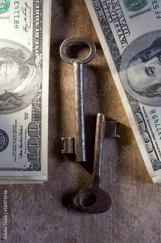 Photo: Key to Financial Success. Money, keys. Key to Financial Success. Money, keys.