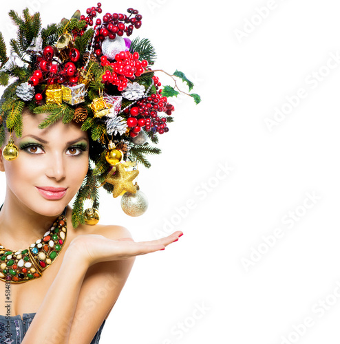 Photo: Christmas Woman. Christmas Holiday Hairstyle and Makeup Christmas Woman. Christmas Holiday Hairstyle and Makeup