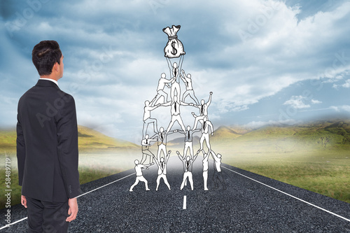 Photo: Composite image of businessman turning his back to camera Composite image of businessman turning his back to camera
