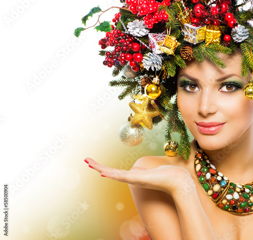 Photo: Christmas Woman. Christmas Holiday Hairstyle and Makeup Christmas Woman. Christmas Holiday Hairstyle and Makeup