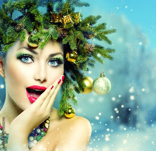 Photo: Christmas Woman. Christmas Holiday Hairstyle and Makeup Christmas Woman. Christmas Holiday Hairstyle and Makeup