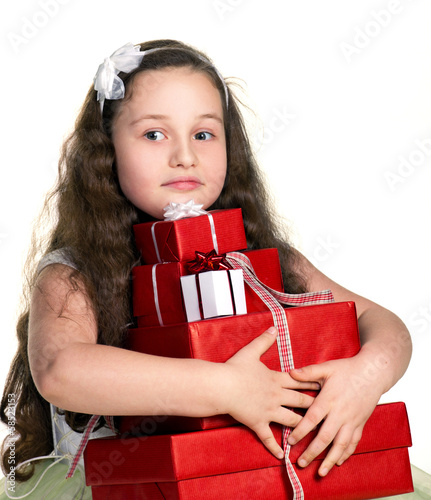 Photo: little girl with gifts little girl with gifts
