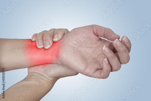 Photo: Acute pain in a woman Wrist. Acute pain in a woman Wrist.