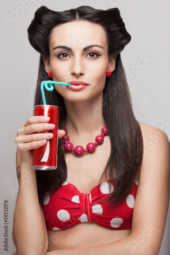 Photo: close-up of drinking soda beautiful model close-up of drinking soda beautiful model