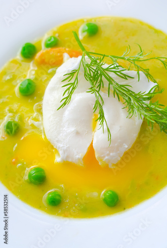 Photo: Fresh soup from green peas and egg-poached Fresh soup from green peas and egg-poached
