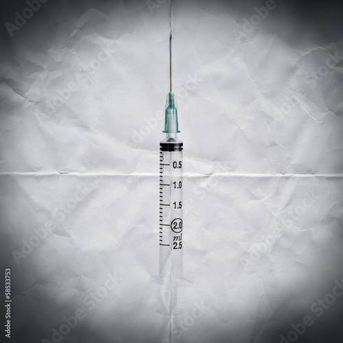 Photo: syringe paper background syringe paper background