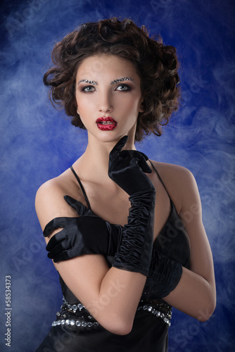 Photo: Portrait of young brunette girl in fashion style Portrait of young brunette girl in fashion style