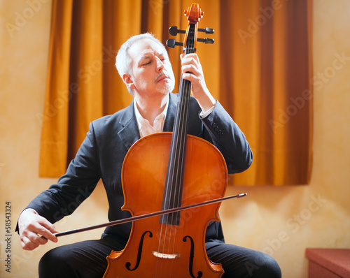Photo: Man playing a cello Man playing a cello