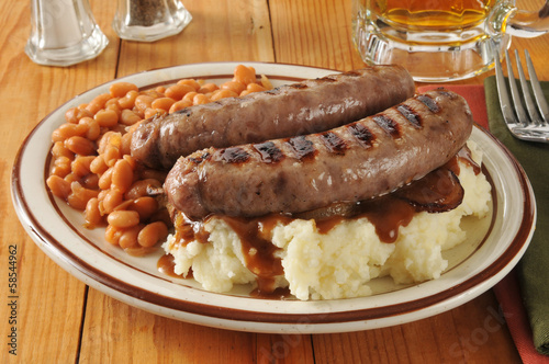 Photo: Bangers and mash with baked beans Bangers and mash with baked beans