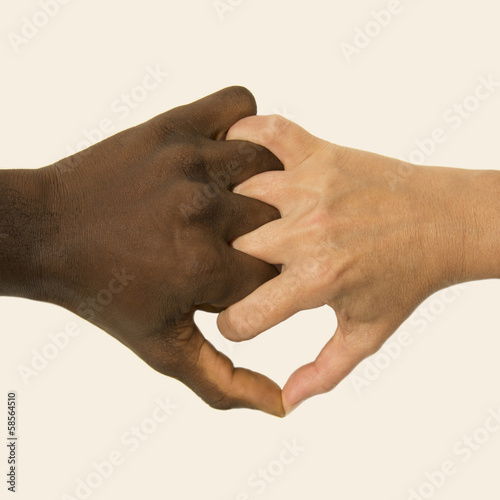 Photo: Mixity - Two joint hands symbolizing diversity Mixity - Two joint hands symbolizing diversity