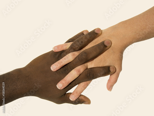 Photo: Mixity - Two joint hands symbolizing diversity Mixity - Two joint hands symbolizing diversity