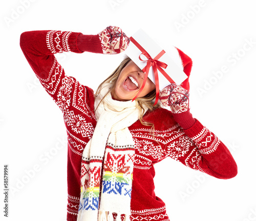 Photo: Happy woman with christmas present. Happy woman with christmas present.