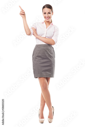 Photo: Young businesswoman pointing Young businesswoman pointing