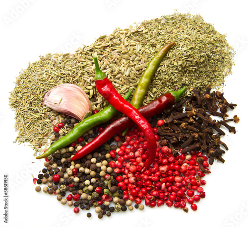 Photo: Powder spices in white table background Powder spices in white table background