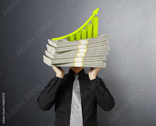 Photo: head lifting dollar businessman head lifting dollar businessman