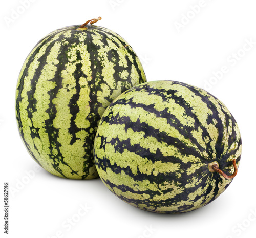 Photo: Two ripe watermelons berry isolated on white with clipping path Two ripe watermelons berry isolated on white with clipping path