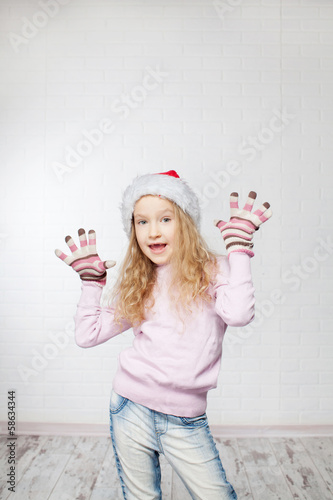 Photo: Child in christmas hat Child in christmas hat