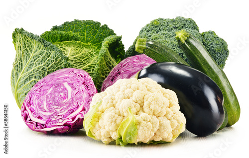 Photo: Variety of fresh organic vegetables isolated on white Variety of fresh organic vegetables isolated on white