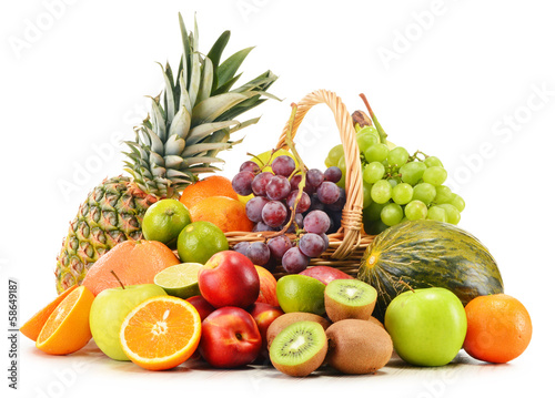 Photo: Variety of fruits in wicker basket isolated on white Variety of fruits in wicker basket isolated on white