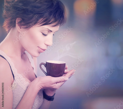 Photo: Coffee. Beautiful Girl Drinking Tea or Coffee Coffee. Beautiful Girl Drinking Tea or Coffee