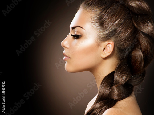 Photo: Hair Braid. Beautiful Woman with Healthy Long Hair Hair Braid. Beautiful Woman with Healthy Long Hair