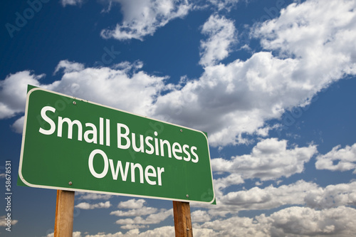 Photo: Small Business Owner Green Road Sign and Clouds Small Business Owner Green Road Sign and Clouds