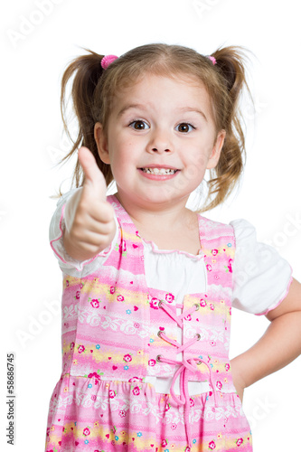 Photo: Happy smiling kid girl with ok hand sign Happy smiling kid girl with ok hand sign