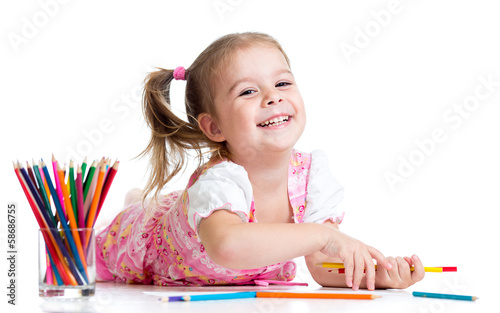 Photo: kid girl drawing with pencils kid girl drawing with pencils