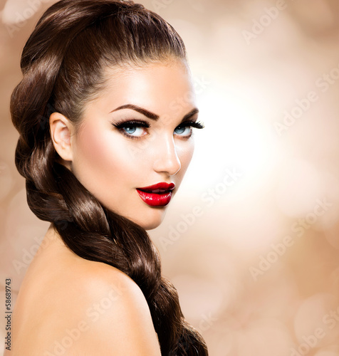 Photo: Hair Braid. Beautiful Woman with Healthy Long Brown Hair Hair Braid. Beautiful Woman with Healthy Long Brown Hair