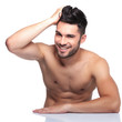 young laughing man is posing for the camera young laughing man is posing for the camera