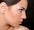 A portrait of a beautiful woman isolated on black background. A portrait of a beautiful woman isolated on black background.