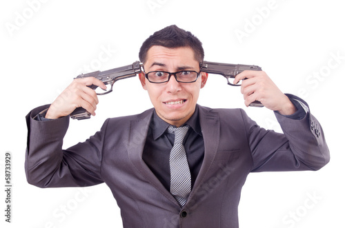 Photo: Funny businessman with gun on white Funny businessman with gun on white
