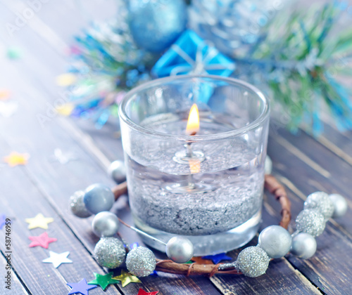 Photo: candle and christmas decoration candle and christmas decoration