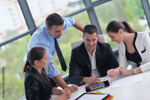 Photo: business people group in a meeting at office business people group in a meeting at office