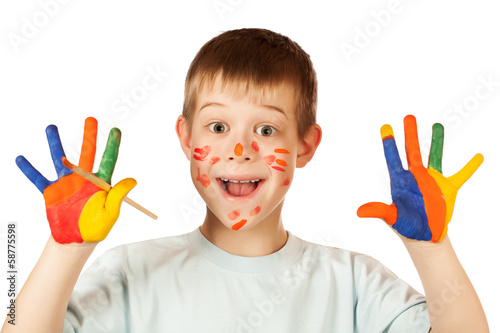 Photo: smiling happy boy with stained coloured hand smiling happy boy with stained coloured hand