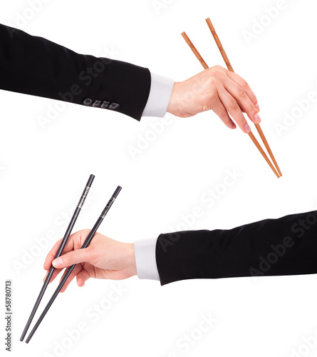 Photo: Businessman's hand Holding Chopsticks Businessman's hand Holding Chopsticks