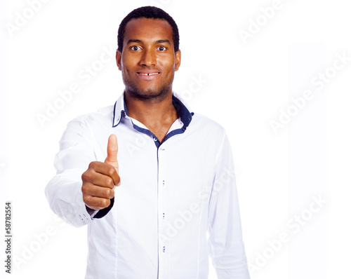 Photo: Handsome black man thumbs up, isolated on white background Handsome black man thumbs up, isolated on white background