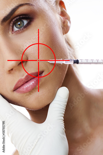 Photo: Cosmetic injection to the pretty woman face Cosmetic injection to the pretty woman face