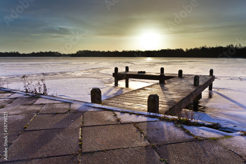 Photo: Cool Colored Sunrise over Lake in Winter Cool Colored Sunrise over Lake in Winter